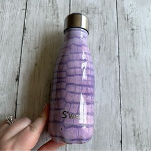 PREOWNED SWELL BOTTLE 9 OUNCE PURPLE SNAKE PATTERN
